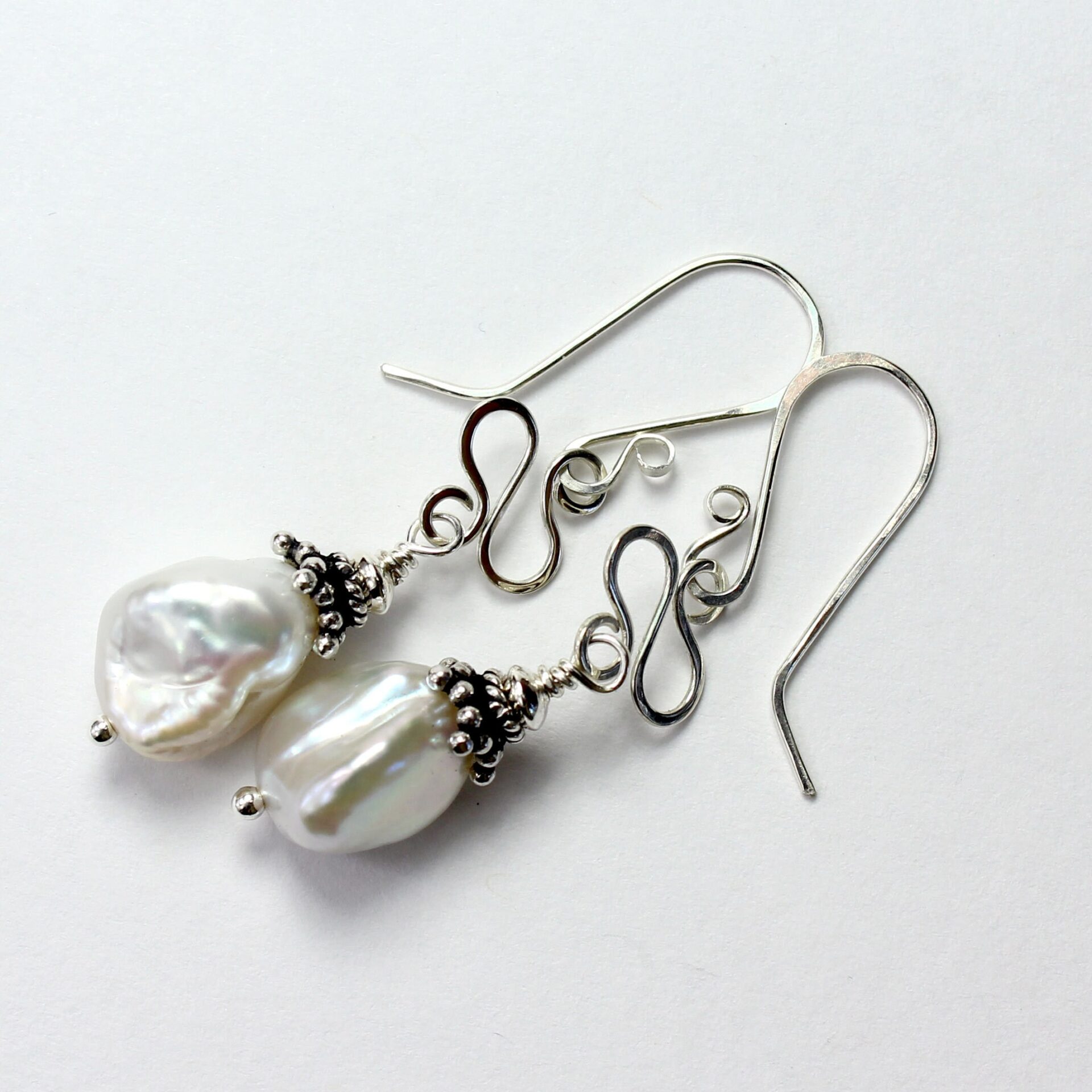 Keshi Pearls Drop from Silver Swirl Wire